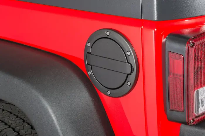 AMP Research Fuel Door for 07-18 Jeep Wrangler JK in Black for 07-18 Jeep Wrangler JK