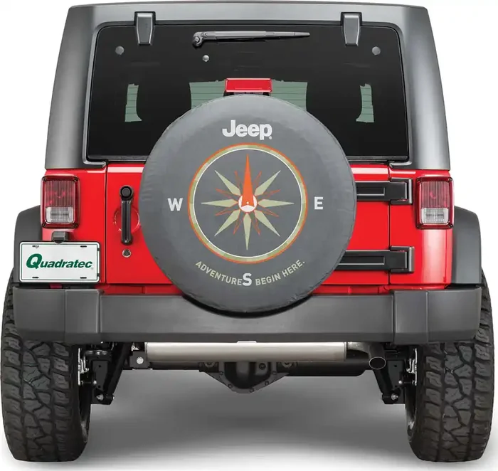Mopar Jeep Logo Tire Cover Black Denim with “Adventures Begin Here.”